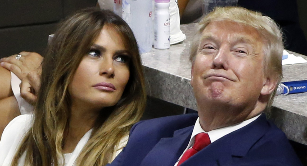 Republican presidential candidate Donald Trump, second from left, and his wife, Melania, left, watch play between Serena Williams and Venus Williams during a quarterfinal match at the U.S. Open tennis tournament, Tuesday, Sept. 8, 2015, in New York. (AP Photo/Jason DeCrow)